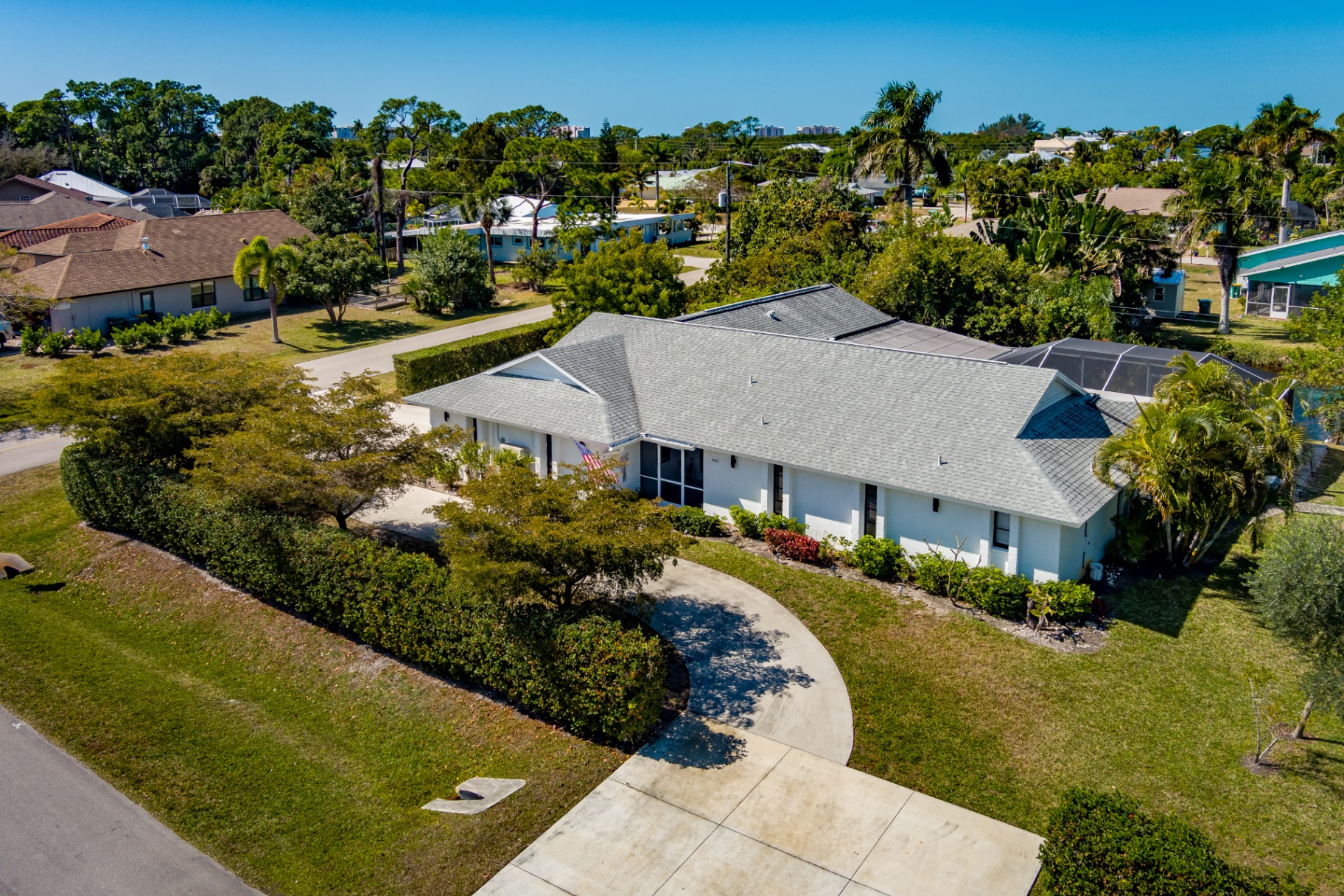Aerial view of the home and circular drive