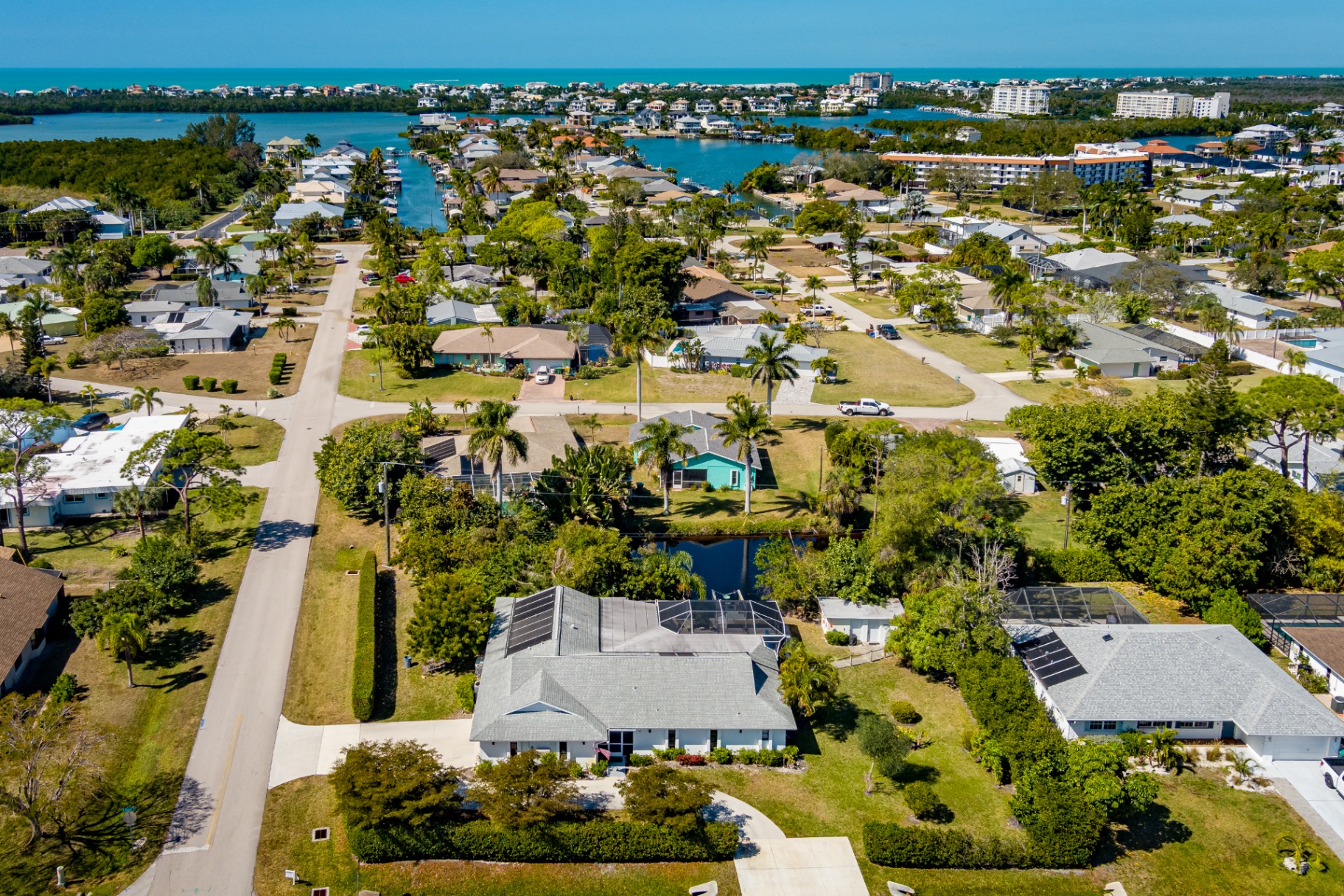 Aerial view of Bonita Shores with the Gulf of Mexico and Estero Bay nearby